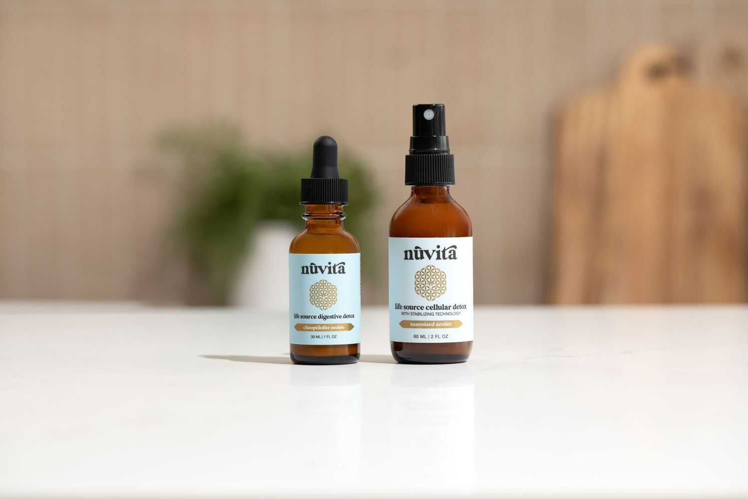 Nuvita Global Detox Duo sitting on counter with decorative background