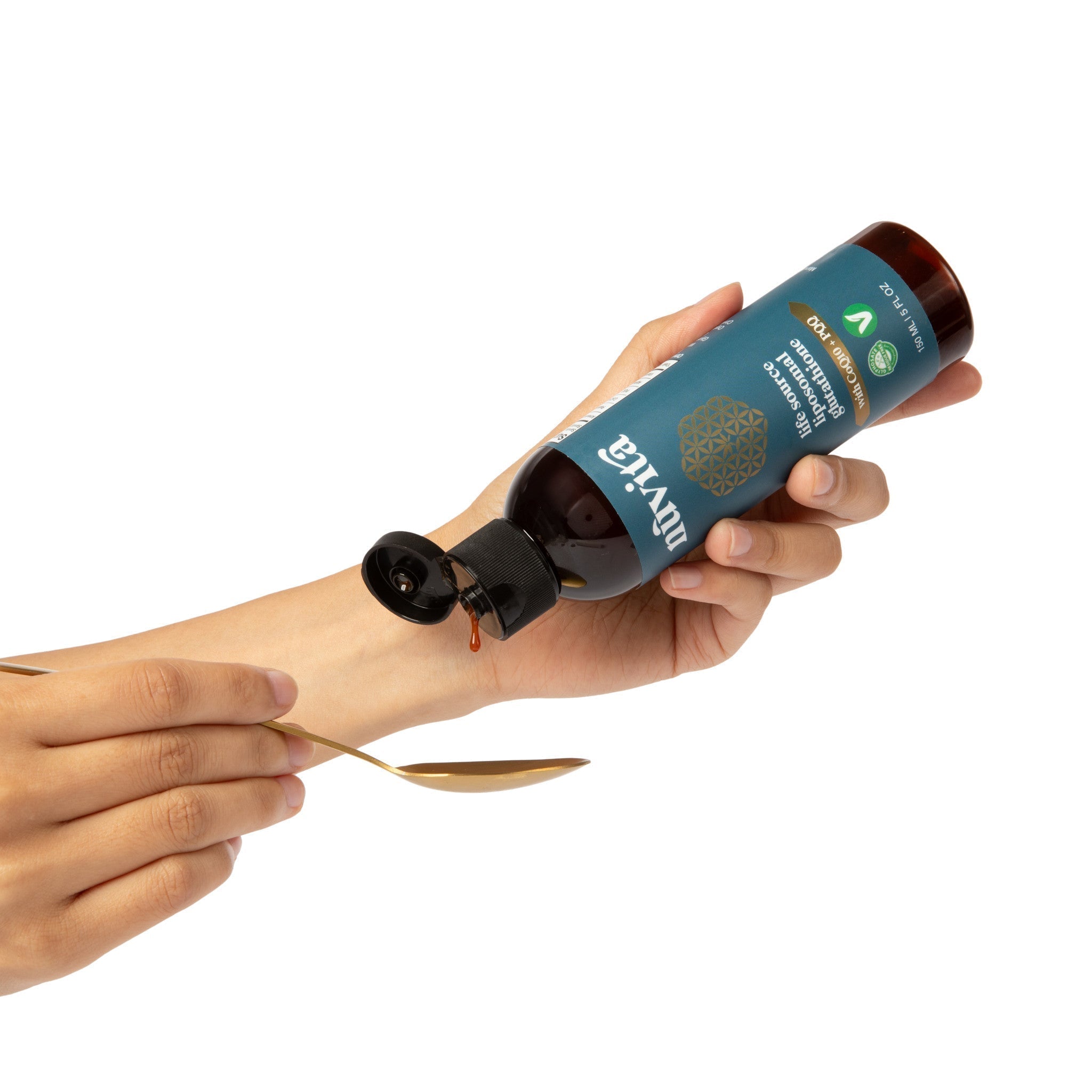 Bottle of Nuvita's Liposomal Glutathione being poured into a spoon being held by a hand