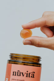 Chill gummy held in hand